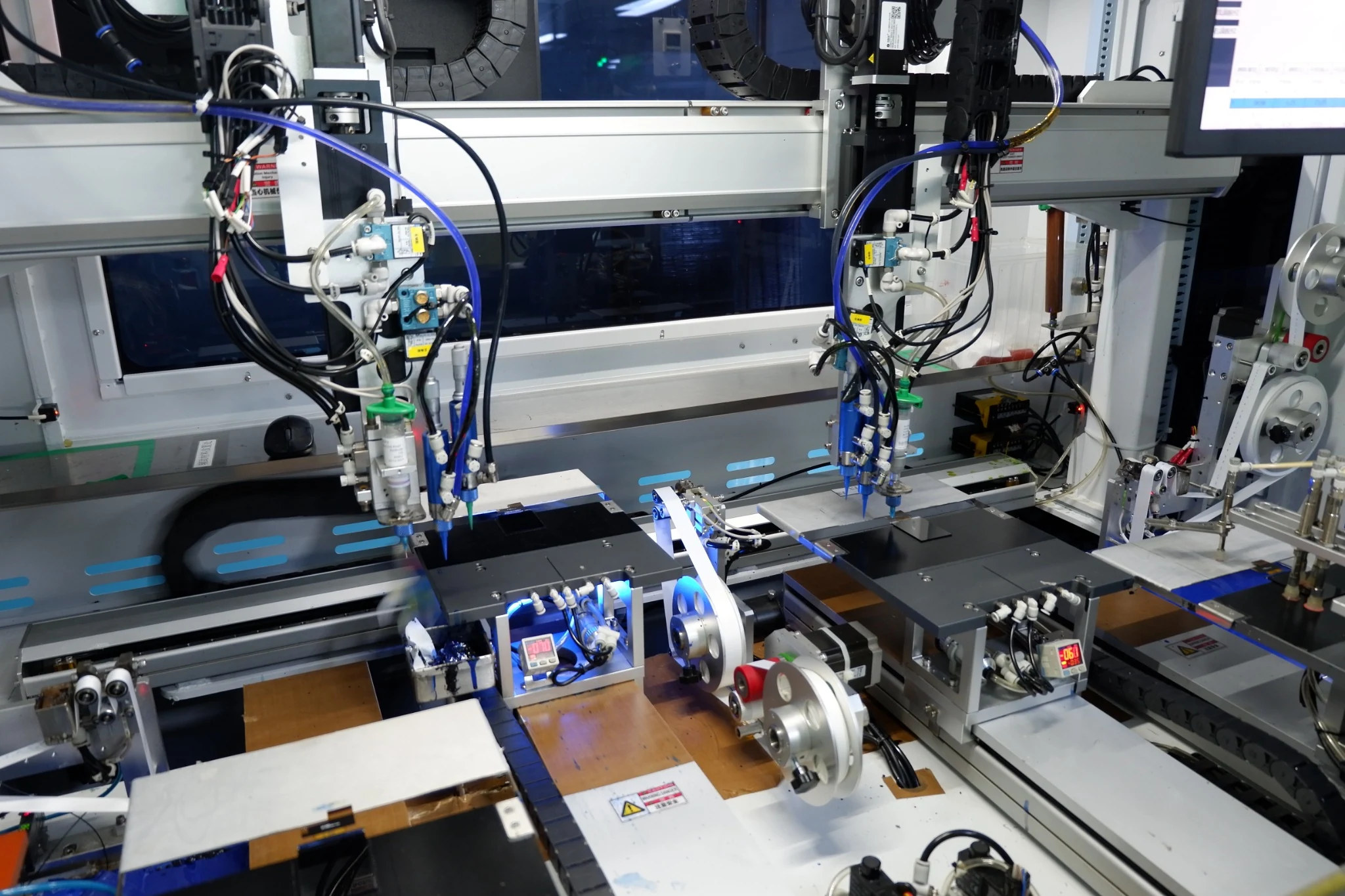 Automated dispensing and assembly equipment