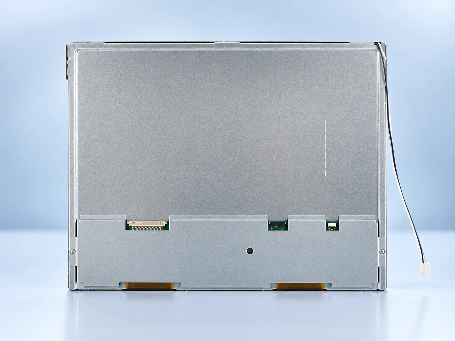 Rear reference view of DS-T121QXHA-01 showing the metal housing, connector area and side cable
